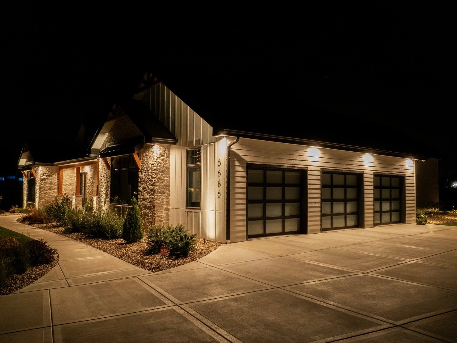 Residential outdoor security lighting improving visibility around a home at night Residential outdoor security lighting improving visibility around a home at night